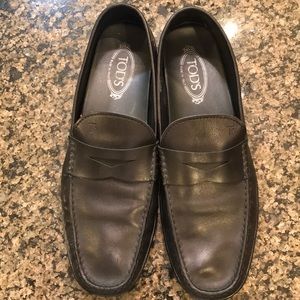 Tod’s black penny loafers